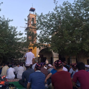 A mosque in Kumul, Xinjiang, China, during Eid Al-fitr prayer, July 2016.