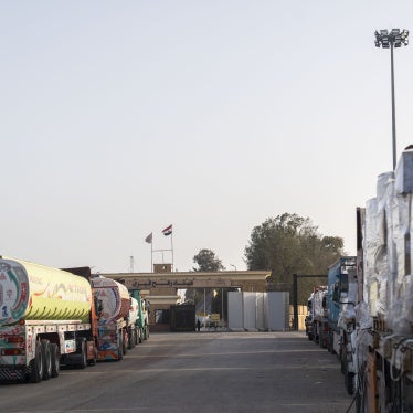 Trucks carrying humanitarian aid wait in Egypt at the Rafah crossing to enter Gaza on January 27, 2026. 