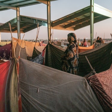 A former bus station hosts internally displaced people who arrived in Gedarefduring during a wave of mass displacement from the Sinjar/Sannar region south of Khartoum, Sudan, July 2024. 