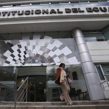 A woman exits the Constitutional Court building, in Quito, Ecuador, February 7, 2024.