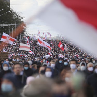 People march in an opposition rally to protest the presidential election results in Minsk, Belarus, October 18, 2020.