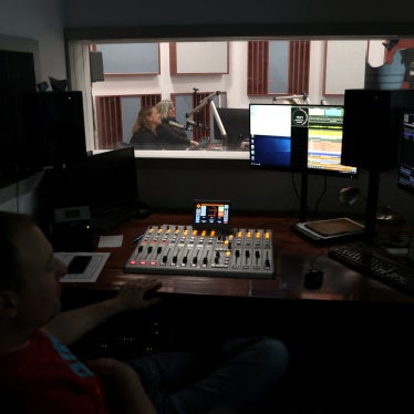 Employees of the Hungarian radio station Klubrádió work at its headquarters in Budapest, Hungary, February 6, 2025.