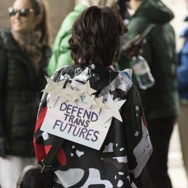 Demonstrators march through central London to protest a restriction on puberty-delaying medications in London, United Kingdom, on April 20, 2024.