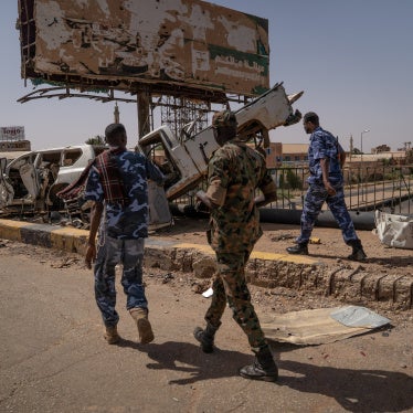 Soldiers of the Sudanese Armed Forces walk on the Shambat Bridge in Khartoum, April 27, 2025.