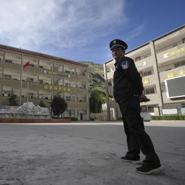 A security guard outside the Shangri-La Key School in Kardze Tibetan Autonomous Prefecture, Sichuan province, China, September 5, 2023. 