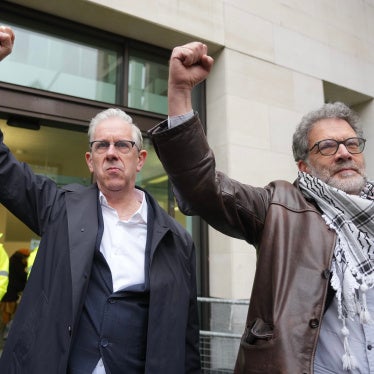Ben Jamal and Chris Nineham, standing outside courthouse