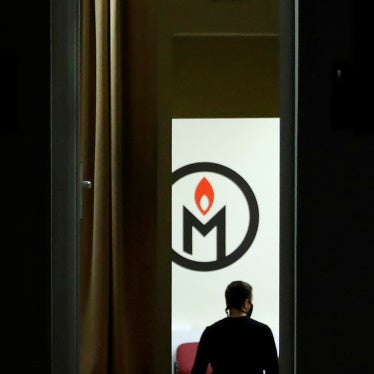 A man walks inside an office of the human rights group Memorial in Moscow, Russia December 29, 2021. Picture taken December 29, 2021. REUTERS/Evgenia Novozhenina