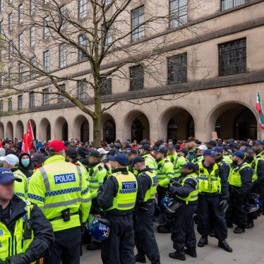 Anti-fascist supporters were kept apart from the Britain First demonstration by police in Manchester, UK, April 18, 2026. 