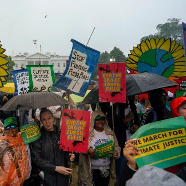 Climate activists hold a rally to protest the use of fossil fuels in front of the White House