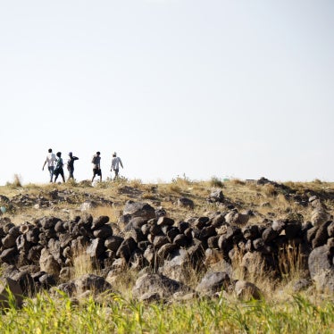 Ethiopian migrants seeking asylum or a better life in Gulf States, walk along a highway to Saadah province to cross into Saudi Arabia, on August 23, 2023 on the outskirts of Sana'a, Yemen.