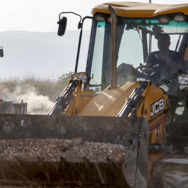 Bulldozers move during ongoing construction work at the settlement of Katzrin in the Israeli-annexed Golan Heights on December 17, 2024.