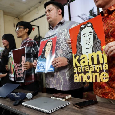 Advocacy for Democracy Team (TAUD) members show solidarity with Andrie Yunus, a rights who suffered burns in an acid attack in Jakarta, Indonesia, March 16, 2026.