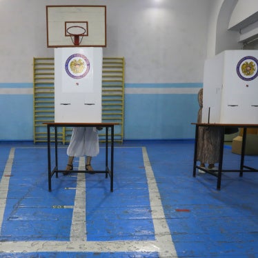 People at a polling station during a parliamentary election in Yerevan, Armenia, June 20, 2021.