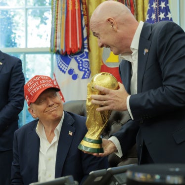 Infantino showing Trump a gold trophy