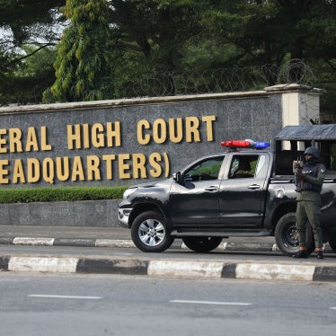 Members of the Nigerian police force are seen outside the Federal High Court, in Abuja, Nigeria, on October 21, 2021.