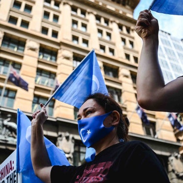 Protesters gather for a rally outside Channel 7 studios in Sydney, Australia, February 4, 2022. 