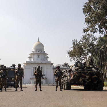 Bangladesh military and Rapid Action Battalion personnel stand guard outside the Supreme Court in Dhaka, February 8, 2025.