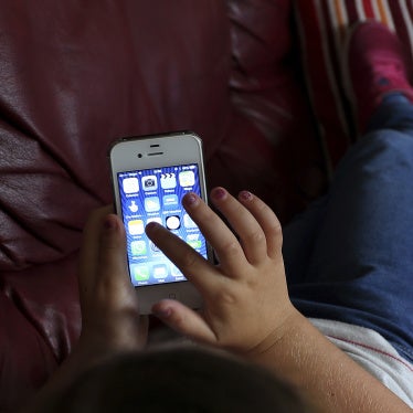 A child using a cellphone.
