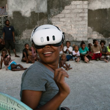 A resident of the Ngongosila community in Malaita Province, Solomon Islands views Virtual Reality content during a demo session.