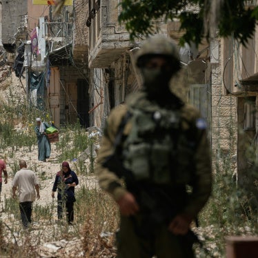 Palestinians collect their belongings from their evacuated homes after the Israeli army issued a number of short-term access permits for residents of the occupied West Bank refugee camp of Tulkarem, June 17, 2026. 