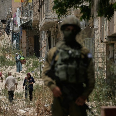 Palestinians collect their belongings from their evacuated homes after the Israeli army issued a number of short-term access permits for residents of the occupied West Bank refugee camp of Tulkarem, June 17, 2026. 