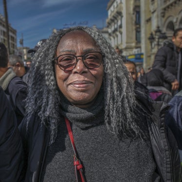 Saadia Mosbah (center), president of the antiracism association Mnemty, attending a march in Tunis, Tunisia, on March 4, 2023. 