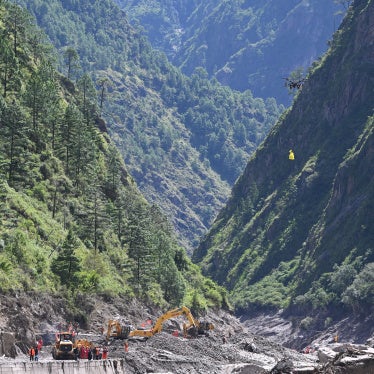 Rescue workers use drones to deliver supplies at Gyirong Port in the Xizang Autonomous Region, China, August 28, 2026. 