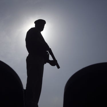 A police officer stands guard in Peshawar, Pakistan, August 5, 2023.