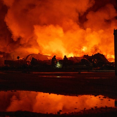 Firefighters put out a fire after Russian missiles hit a warehouse in Kyiv, Ukraine, on August 5, 2026. 