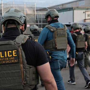 US Immigration and Customs Enforcement (ICE) agents block protesters as cars exit Delaney Hall, which is being used as an ICE detention center, on May 27, 2026 in Newark, New Jersey.