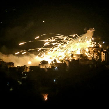 A white phosphorus munition airbursts over buildings in the town of Khiam in southern Lebanon during an Israeli bombardment on October 31, 2024.