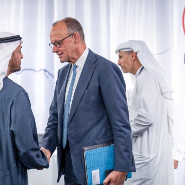 Germany's Chancellor Friedrich Merz, UAE's President Sheikh Mohamed bin Zayed al-Nahyan shake hands.