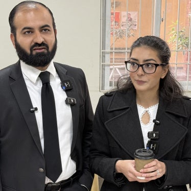 Human rights lawyers Imaan Mazari (right) and Hadi Ali Chattha, during a court hearing in Islamabad, Pakistan, December 5, 2025. 