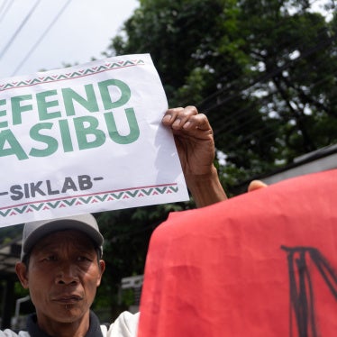 Indigenous residents from Nueva Vizcaya province protest outside the Mines and Geosciences Bureau and the Department of Environment and Natural Resources in Quezon City, Philippines, on July 13, 2026.