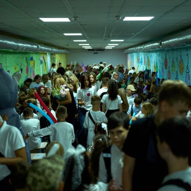 Children, parents, and teachers shelter underground during an air raid alert amid traditional back-to-school celebrations in Kyiv, Ukraine, September 1, 2026.