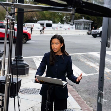 MS NOW White House Correspondent Akayla Gardner prepares for a television report on a street corner outside the White House grounds in Washington, DC, on September 21, 2026.