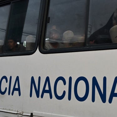 A group of detained fishermen are transported on a National Police bus to the Community Surveillance Unit (UVC) from the port of Manta, Ecuador, on September 4, 2026.