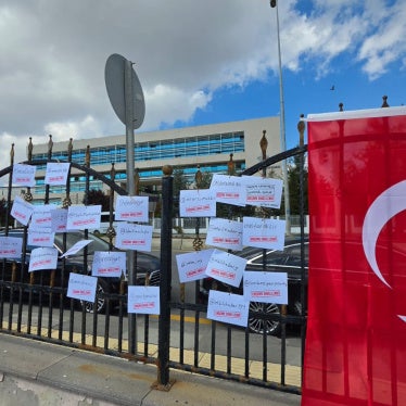 Tags, with “Access blocked” and the name of blocked accounts belonging to journalists and media outlets, LGBT and women’s rights groups, and other rights defenders, are tied to the gates of Turkey’s Constitutional Court, to protest the Turkish authorities’ blocking of hundreds of social media accounts and websites. Ankara, October 7, 2026.
