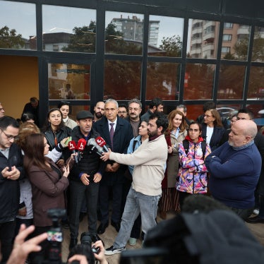 Halk TV general news coordinator Serhan Asker gives an interview to media after the government takeover of the channel, a police raid on the premises, and the announcement of an arrest warrant against its owner and 16 others. Halk TV, Istanbul, October 14, 2026.