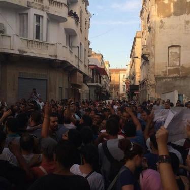 Demonstrators gathered in Mohamed Ali square, near the headquarters of the Tunisian Labor Union in downtown Tunis, protesting the economic reconciliation bill, on September 1, 2015. © 2015 Issam Heni