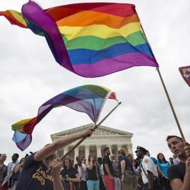 Supporters of gay marriage wave the rainbow flag after the United States Supreme Court ruled on June 26, 2015, that the US Constitution provides same-sex couples the right to marry.