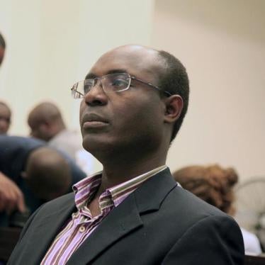 Journalist Rafael Marques de Morais sits in court in Luanda, Angola on May 28, 2015. 