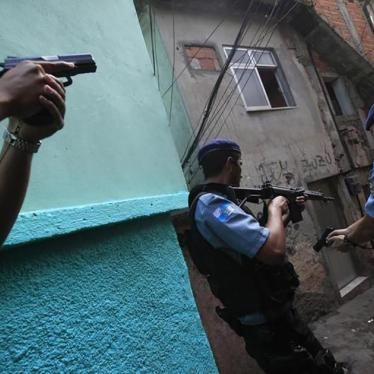 Policemen patrol the Rocinha Slum in Rio de Janeiro on September 14, 2012. 