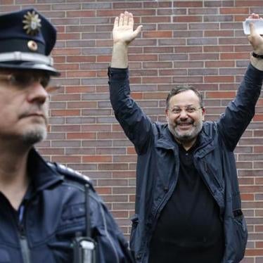 Al Jazeera's journalist Ahmed Mansour gestures as he arrives for a news conference in Berlin, Germany on June 23, 2015. 