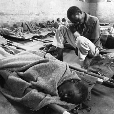 Civilians wounded during the genocide recover in a makeshift hospital in the Sainte Famille church, Kigali, Rwanda.