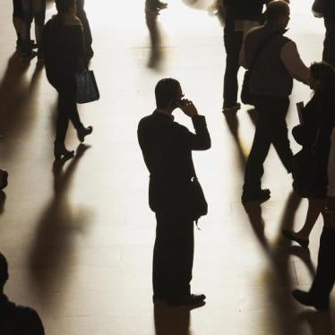 A man stands in the middle of Grand Central Terminal as he speaks on a cell phone in September 2013.