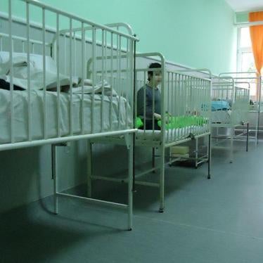 Children with disabilities housed in their cots/dormitories in an institution in Serbia. 