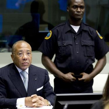 Charles Taylor sits at the defendant's table during his trial at the Special Court for Sierra Leone in The Hague, August 5, 2010.