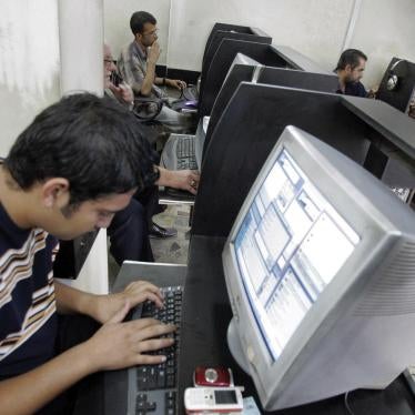 An Iraqi man uses the internet at a cyber cafe in Baghdad on October 6, 2007.