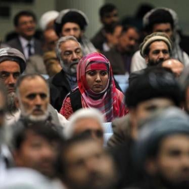 Members of the Loya Jirga, grand council, attend during the last day of the Loya Jirga, in Kabul on November 24, 2013.